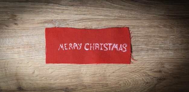 Christmas background the inscription merry Christmas on wooden