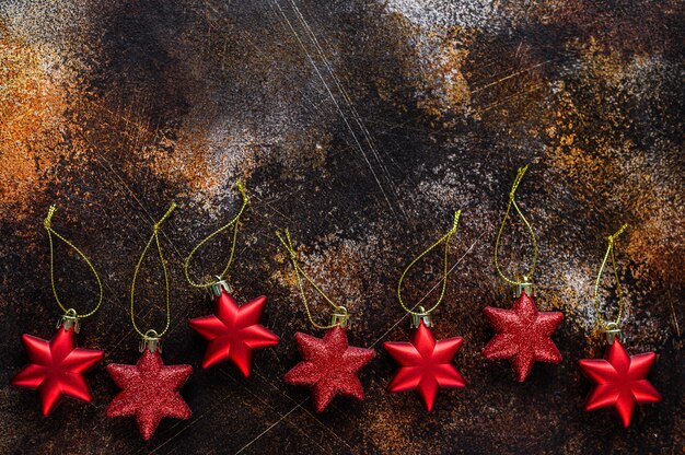 Christmas background, red stars on black