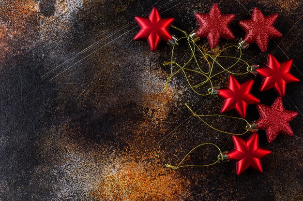 Christmas background, red stars on black