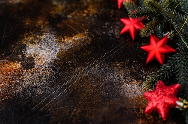 Christmas background, red stars on black