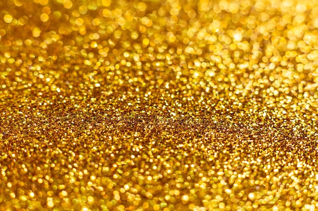 Photo christmas background shiny golden with defocus bokeh