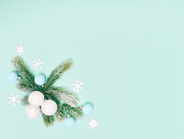 Christmas background. Top view of Christmas decorations. Flat lay of creative design on blue background. Copy space for text.