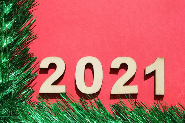 Photo christmas background with 2021 new year's number.