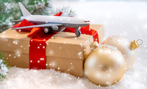 Photo christmas background with airplane. travels. selective focus nature