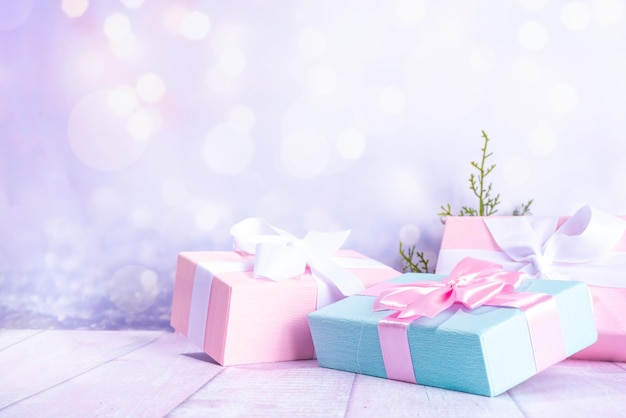 Christmas background with blue and pink gifts