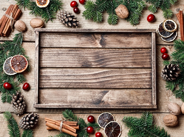 Christmas background with christmas decor on rustic wood