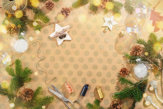 Christmas background with decorations on craft paper in rustic style