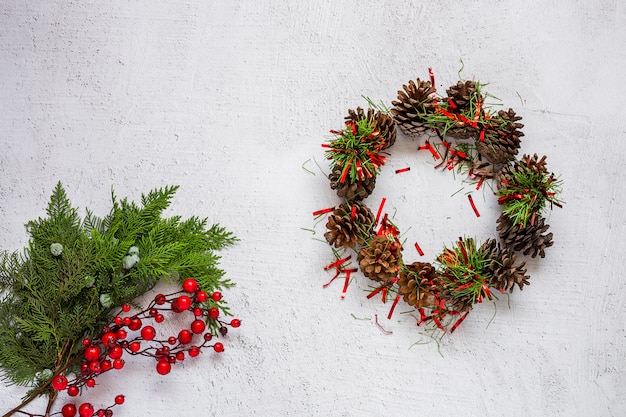 Christmas background with decorations and gift boxes on wooden board.