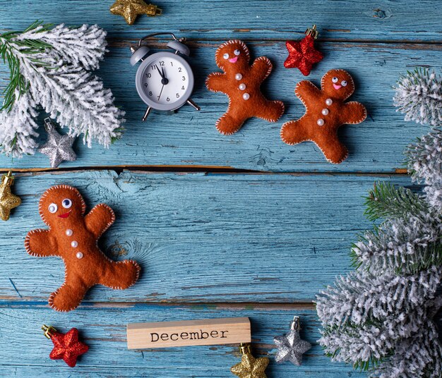 Christmas background with felt gingerbread man