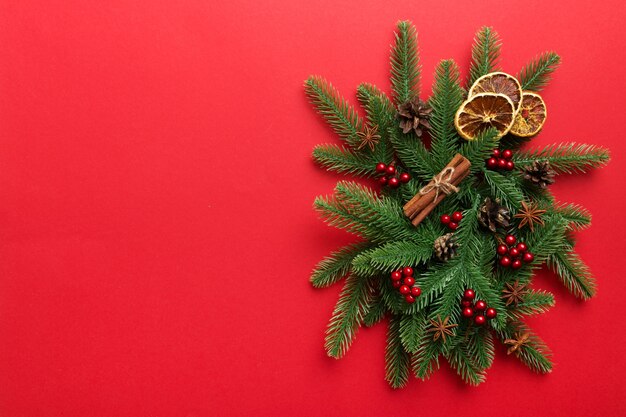 Christmas background with fir branches and Christmas decor. Top view, copy space for text.