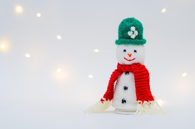 Christmas background with funny snowman. Christmas card.