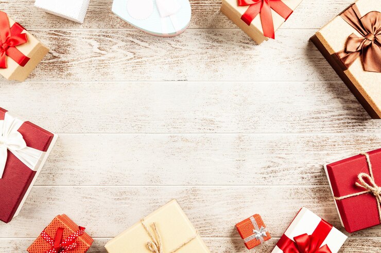 Photo 木製のテーブルにギフトボックスとクリスマスの背景