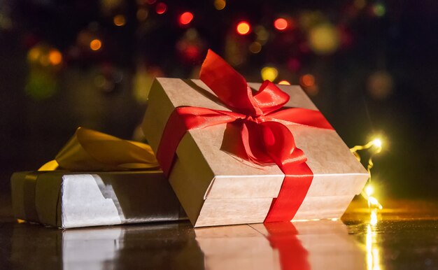 Christmas background with gifts under the Christmas tree. Selective focus. holiday.