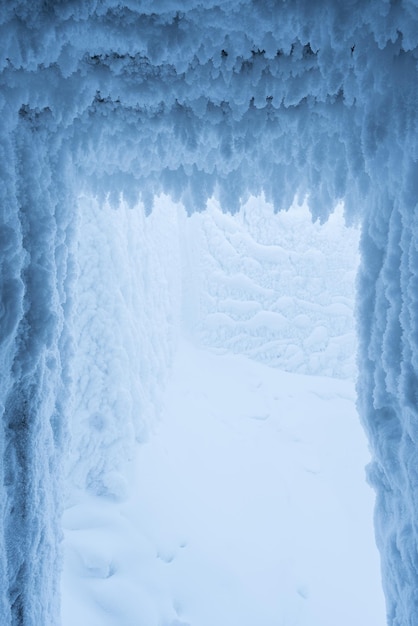 Christmas background with hoarfrost on the walls