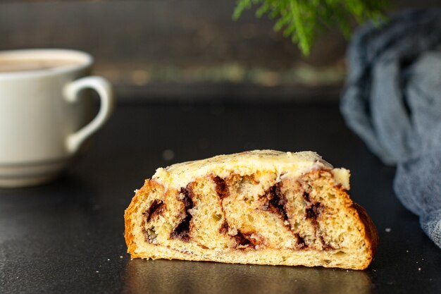 christmas baked cake on black table