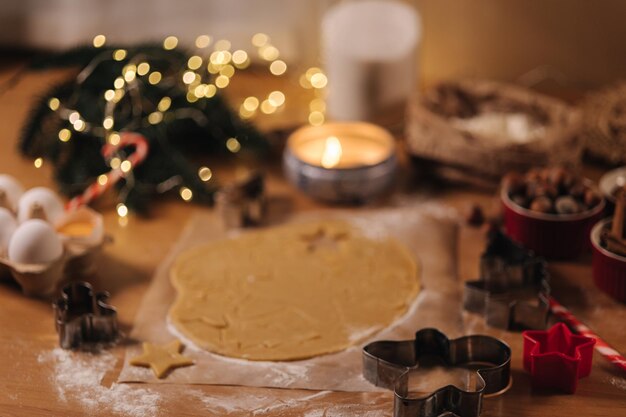 Christmas bakery of gingerbread cutting cookies of gingerbread dough christmas and new year