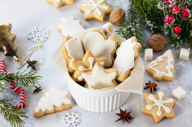 Christmas baking Gingerbread in a cup and decorative ornaments on a festive table