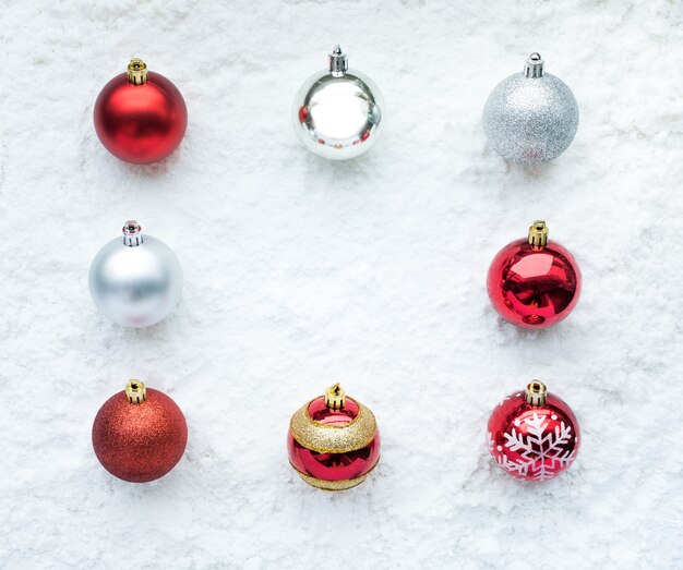 Christmas ball ornament on snow background