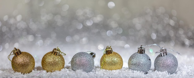 Christmas balls on abstract bokeh lights background