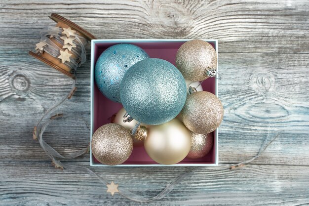 Christmas balls in a blue box