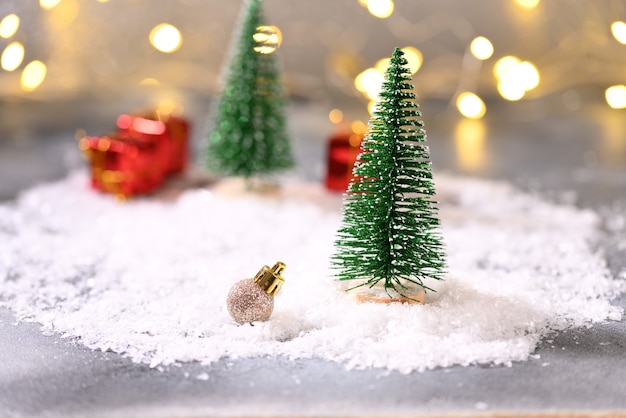 Christmas balls on christmas tree in the snow christmas theme