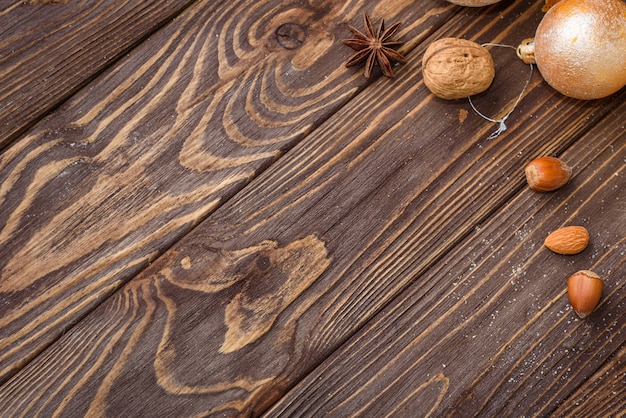 Christmas balls decor on old wood background