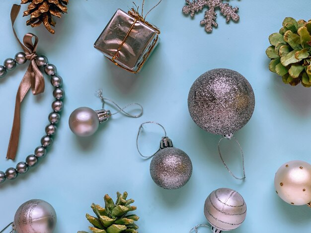 Christmas balls of different colors, red, blue, yellow and pink on a white background. Christmas concept.