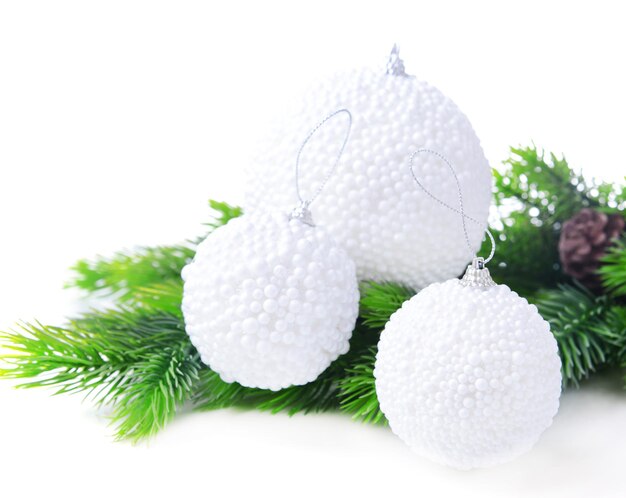 Christmas balls on fir tree, isolated on white