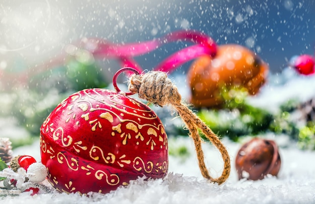 Christmas balls jingle bells and ribbon with Christmas decoration