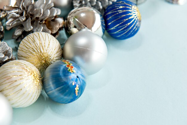 Christmas balls and ornaments on a blue background