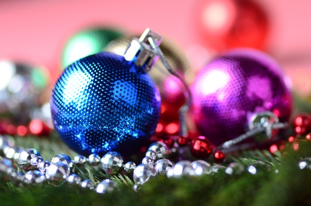 Christmas balls and ornaments with the branch of Christmas tree