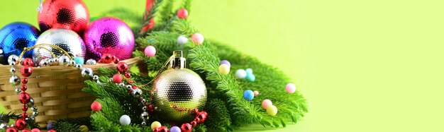 Christmas balls and ornaments with a branch of Christmas tree