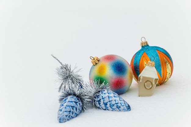 christmas balls on snow, holidays background