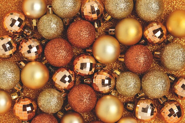 Christmas baubles on a gold glittering background