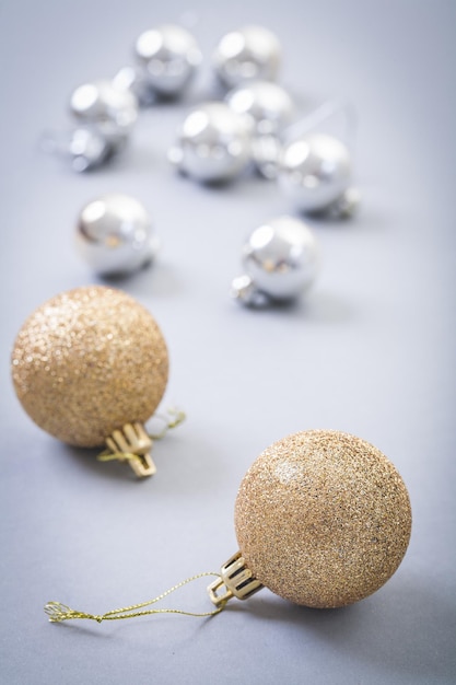 Christmas baubles on gray background