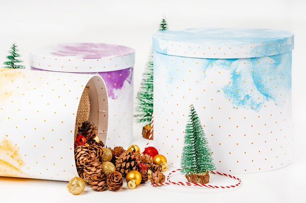 Christmas beautiful gift round boxes Christmas items on a white background with space for text