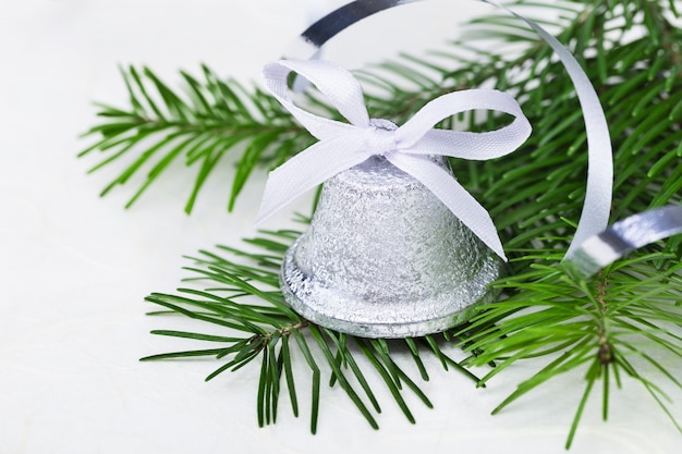 Christmas bell with fir-tree twigs