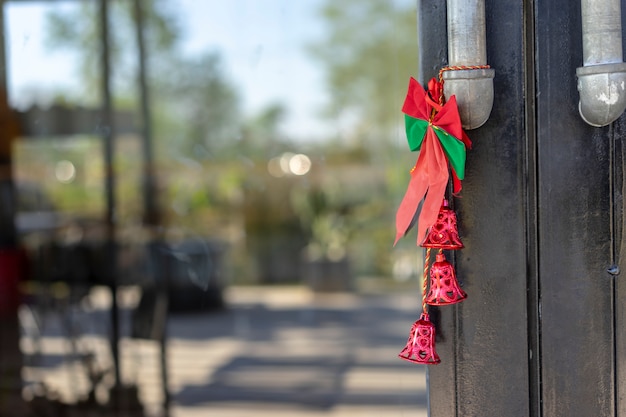 Christmas bells tied at the door.