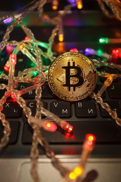 Christmas bitcoin garland gifts and fir branches