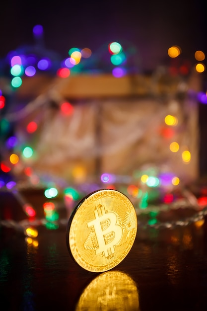 Christmas bitcoin garland gifts and fir branches