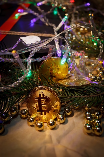 Christmas bitcoin garland gifts and fir branches