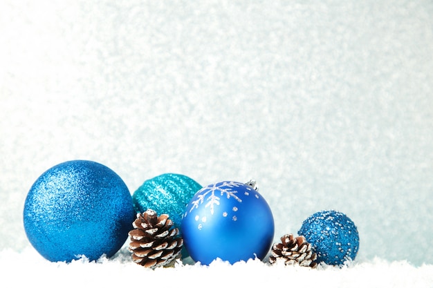 Christmas blue balls on silver background