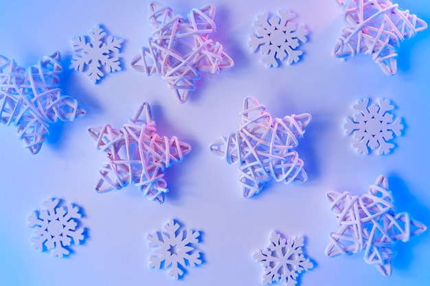 Christmas blue neon wooden stars and snowflakes