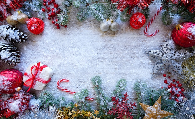 Christmas border frame on white snow