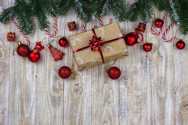 Christmas box of New Year's toys on a wooden background. Selective focus