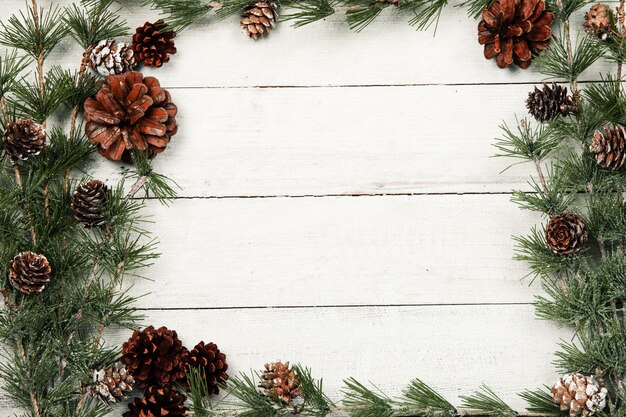 Christmas branches on rustic wooden