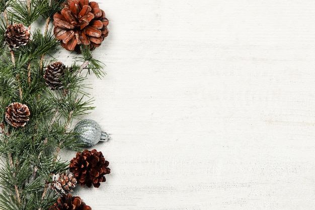 Christmas branches on rustic wooden