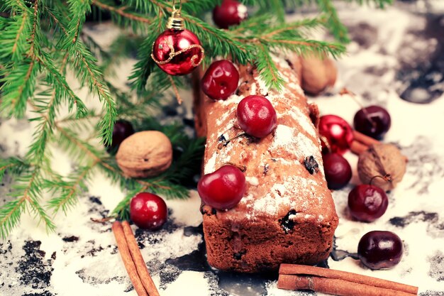 Christmas cake with cherry selective soft focus