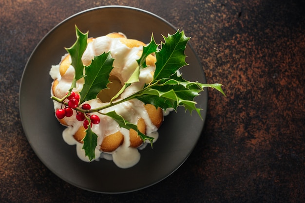 Christmas cake with deco on table