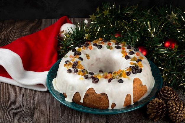 Christmas cake with fondant and candied fruit.